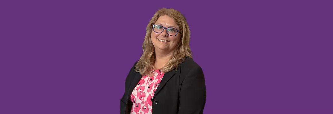 Paula Nickell on purple background